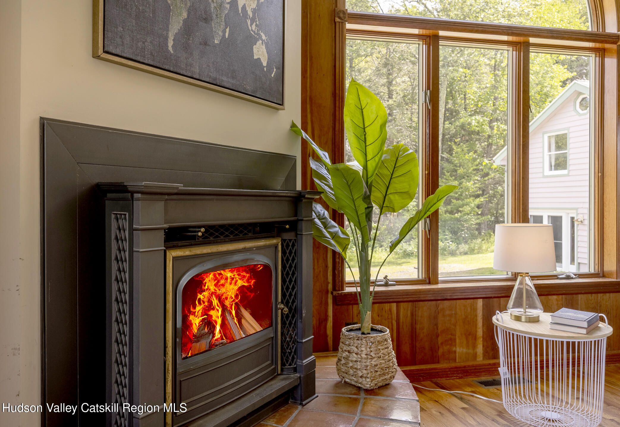 128 Newcut Road Woodstock, NY 12498 - Photo 15 of 51 a living room with fireplace furniture and a flat screen tv