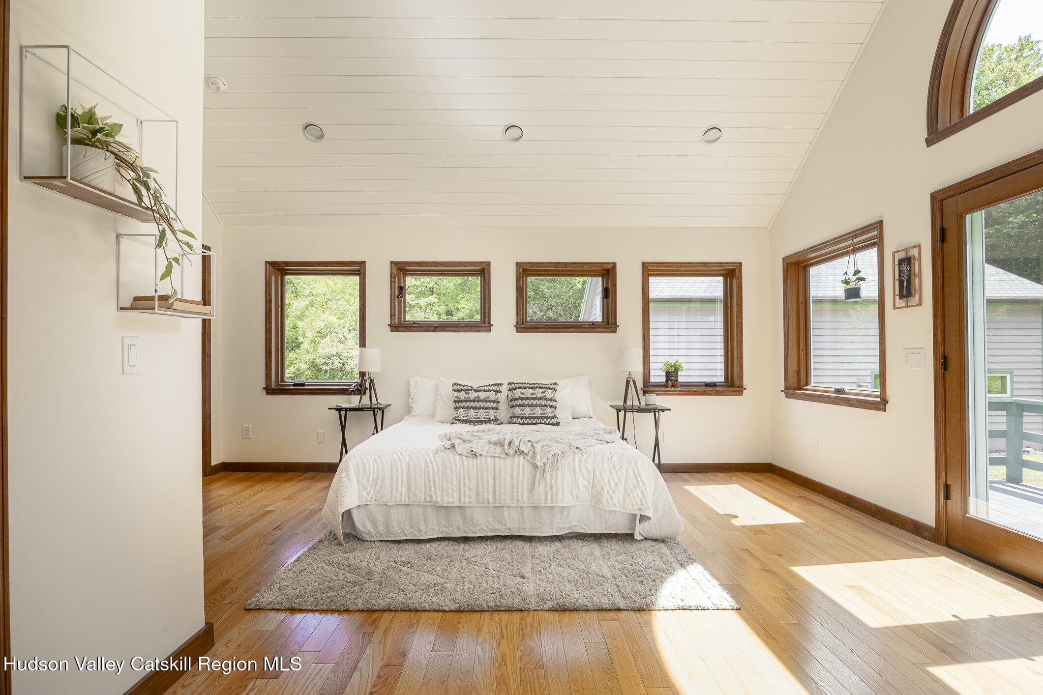 128 Newcut Road Woodstock, NY 12498 - Photo 17 of 51 a bedroom with a large bed and a window