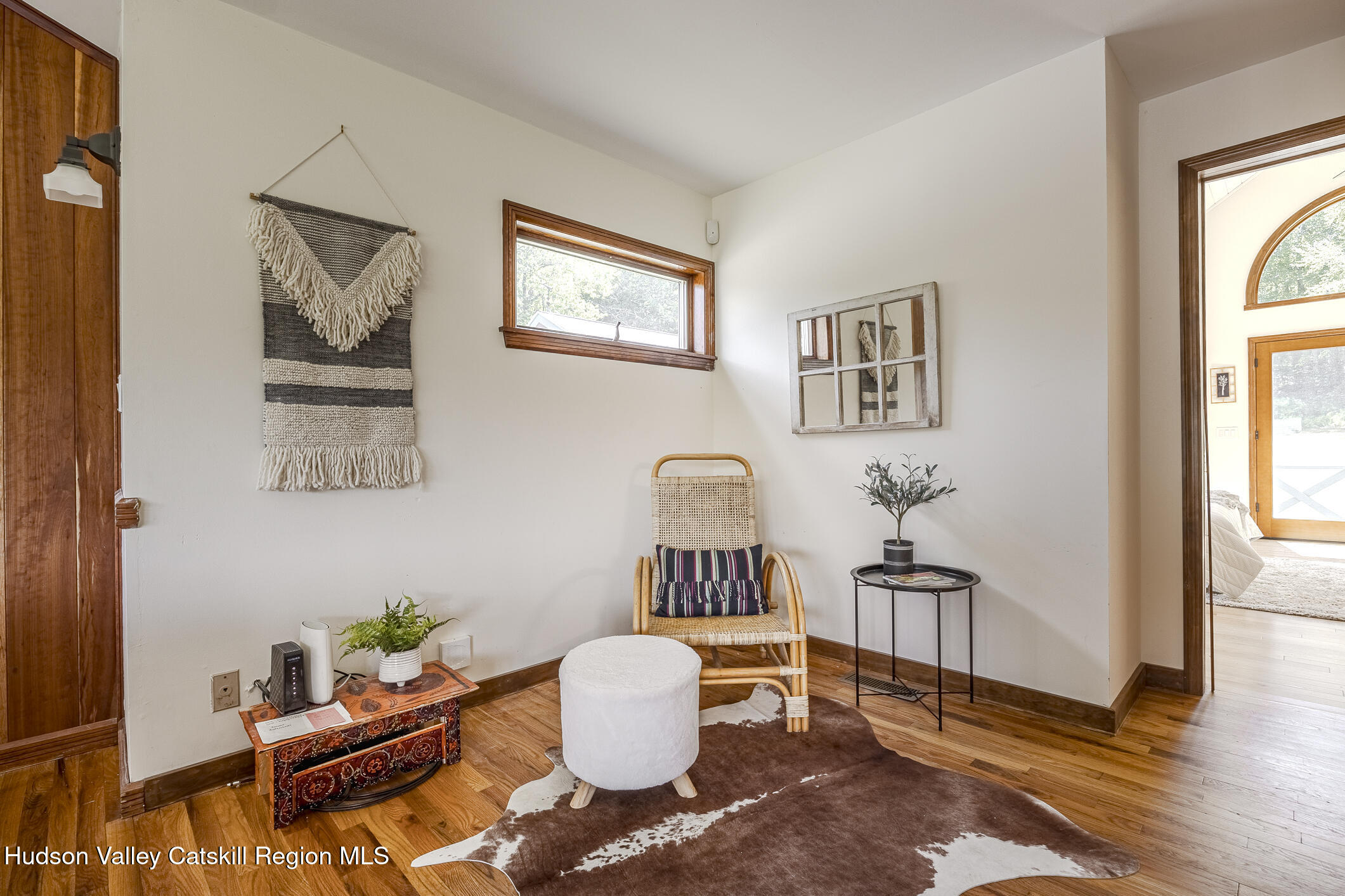 128 Newcut Road Woodstock, NY 12498 - Photo 20 of 51 a living room with furniture and wooden floor