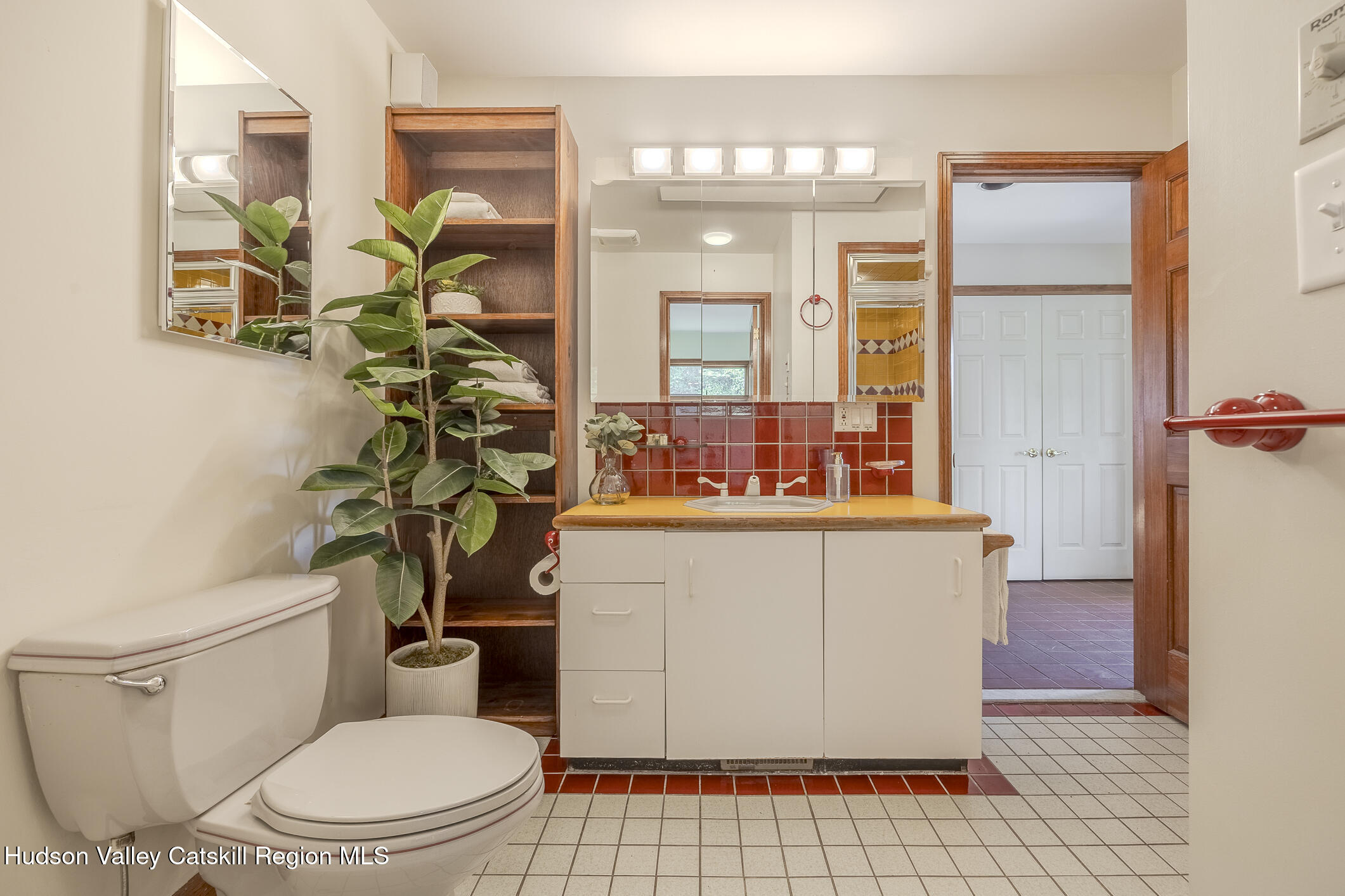 128 Newcut Road Woodstock, NY 12498 - Photo 21 of 51 a bathroom with a granite countertop sink a toilet a mirror and shower