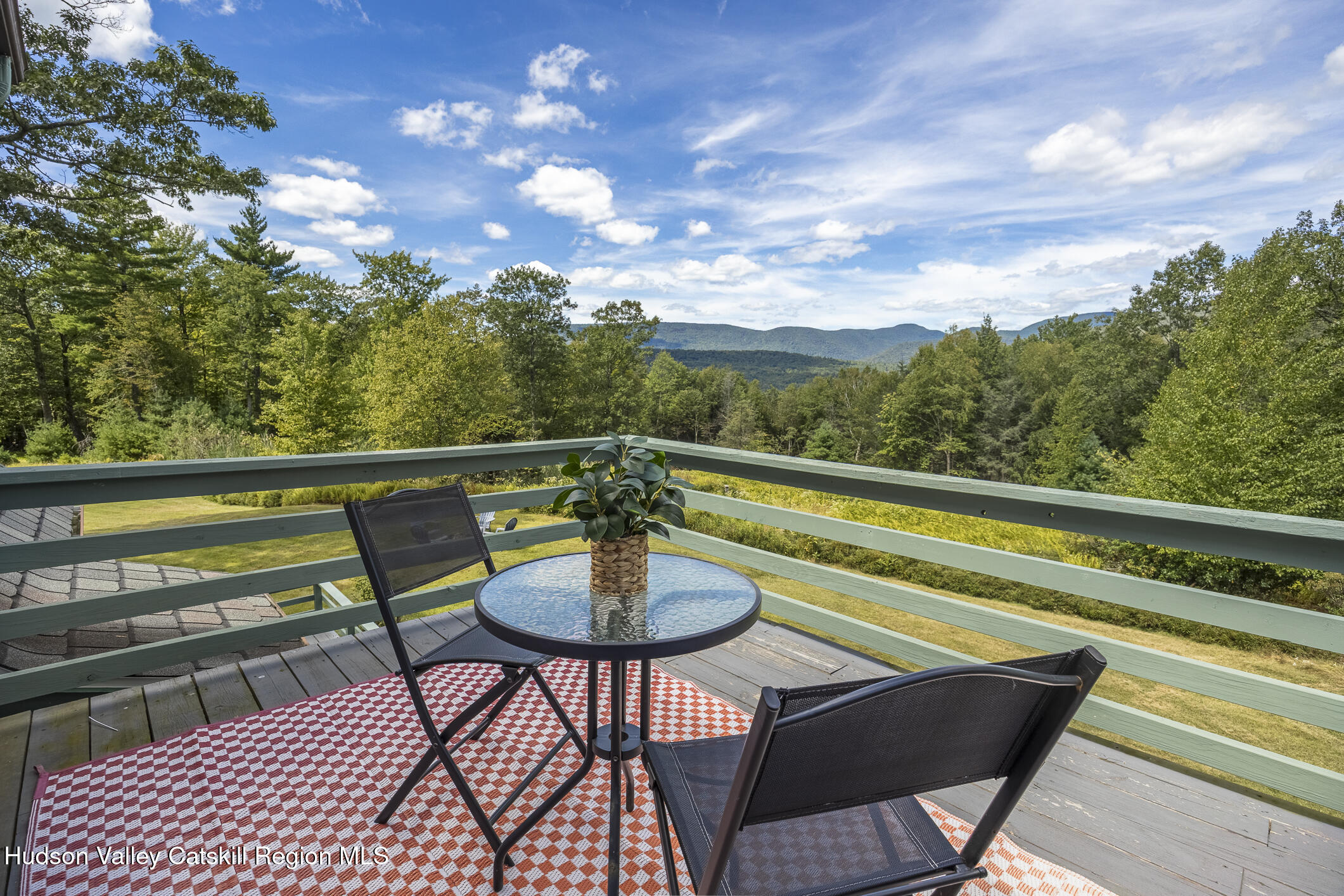 128 Newcut Road Woodstock, NY 12498 - Photo 24 of 51 a view of a chairs and table in the balcony