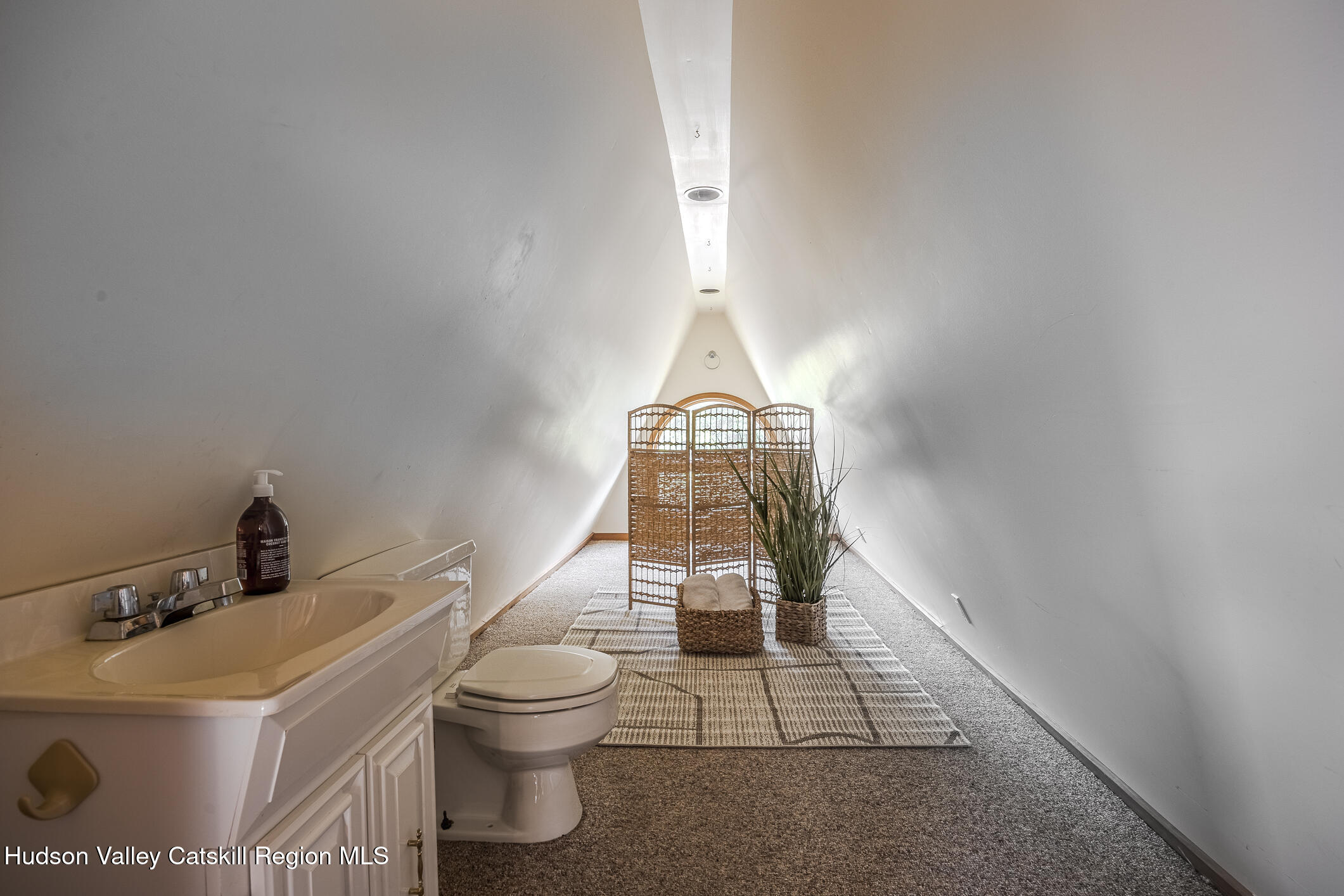 128 Newcut Road Woodstock, NY 12498 - Photo 26 of 51 a bathroom with a sink toilet and mirror