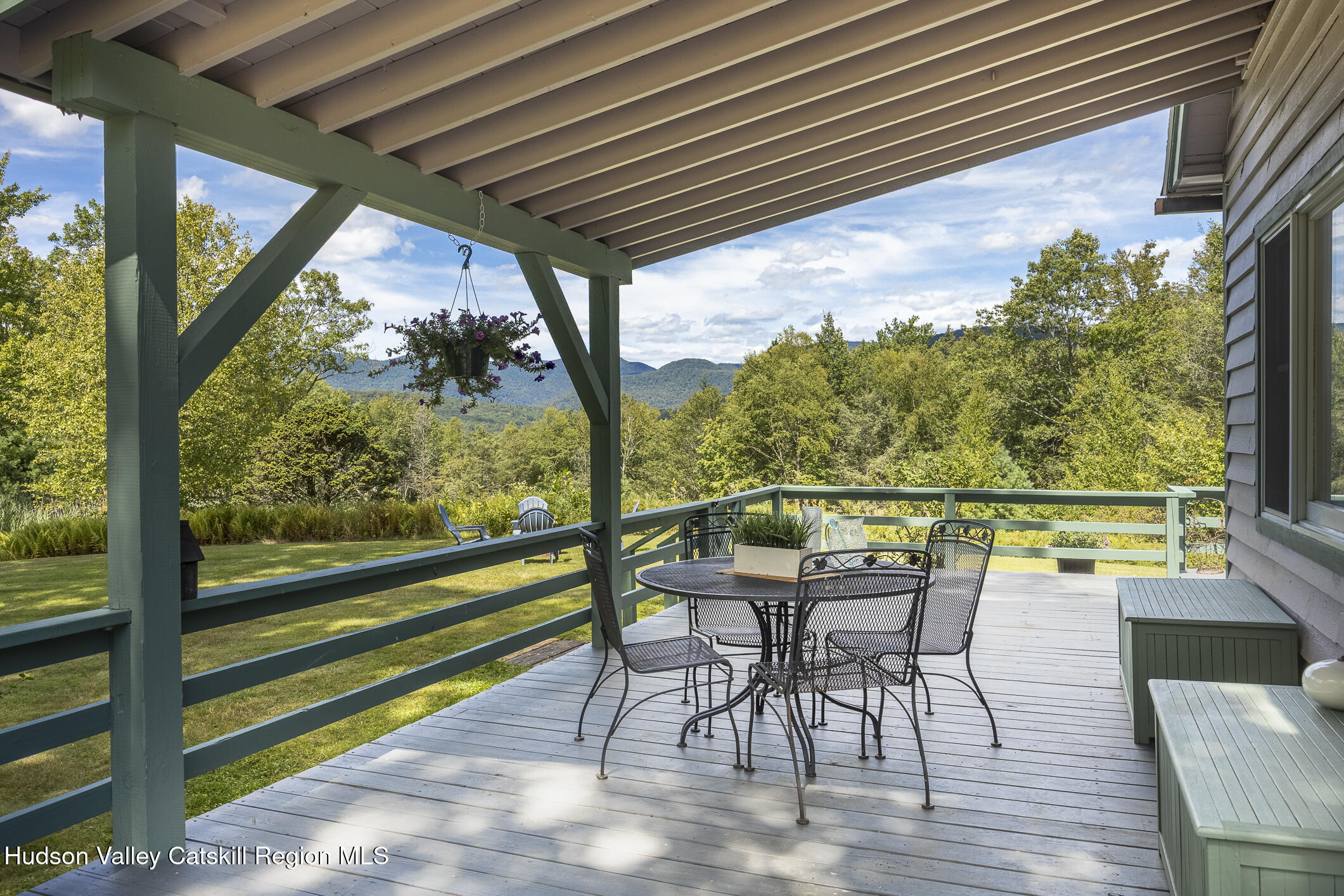 128 Newcut Road Woodstock, NY 12498 - Photo 3 of 51 a view of a porch with furniture and wooden floor