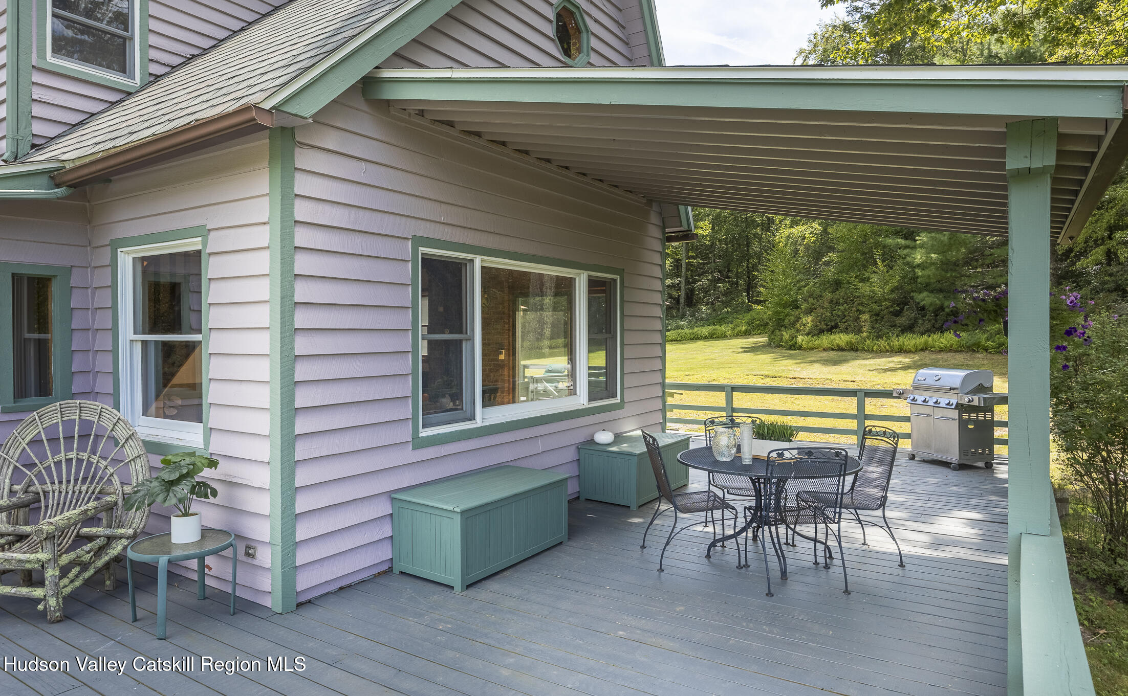 128 Newcut Road Woodstock, NY 12498 - Photo 31 of 51 a backyard of a house with table and chairs