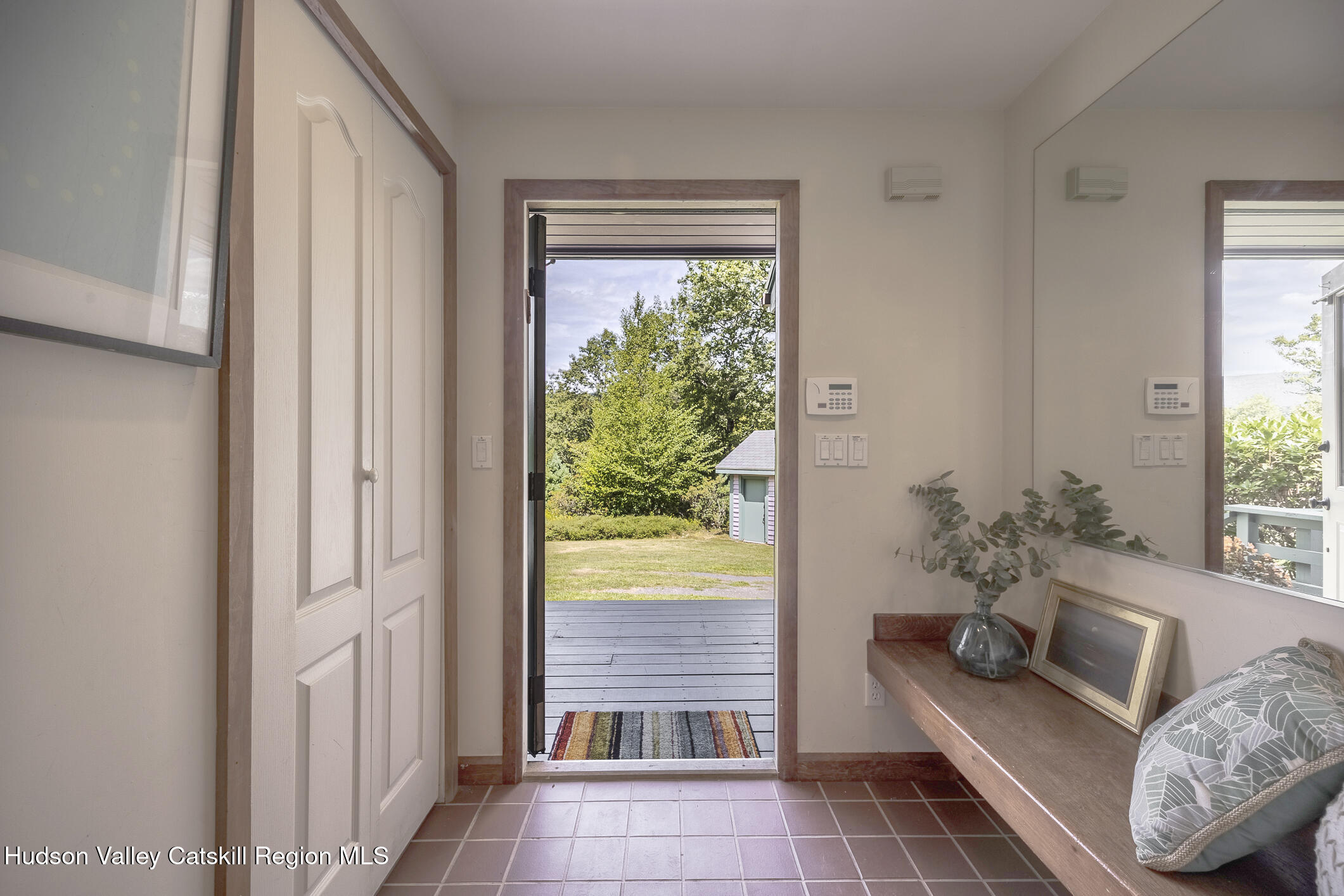 128 Newcut Road Woodstock, NY 12498 - Photo 4 of 51 a living room with furniture and a potted plant