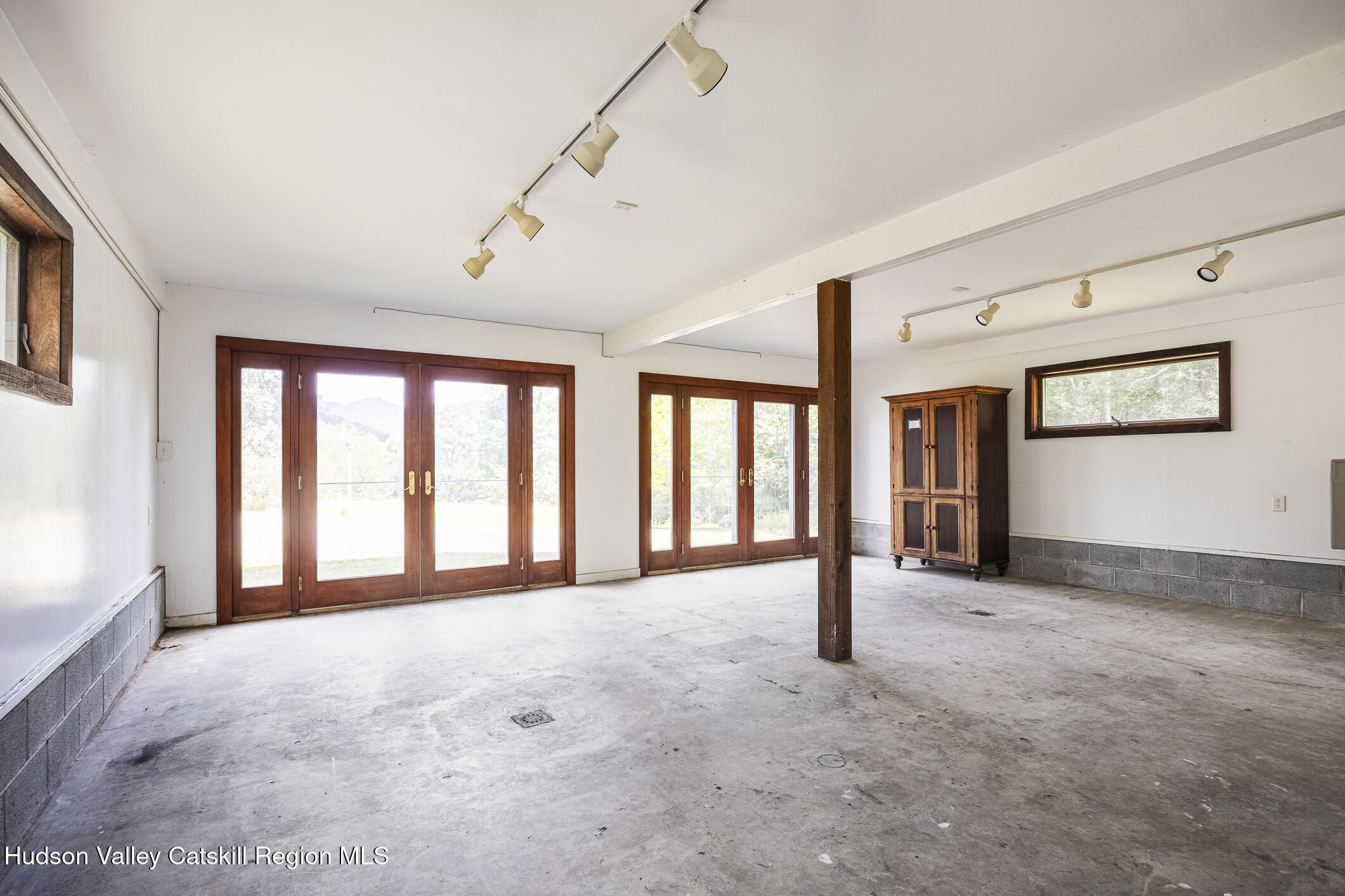 128 Newcut Road Woodstock, NY 12498 - Photo 41 of 51 a view of an empty room with window