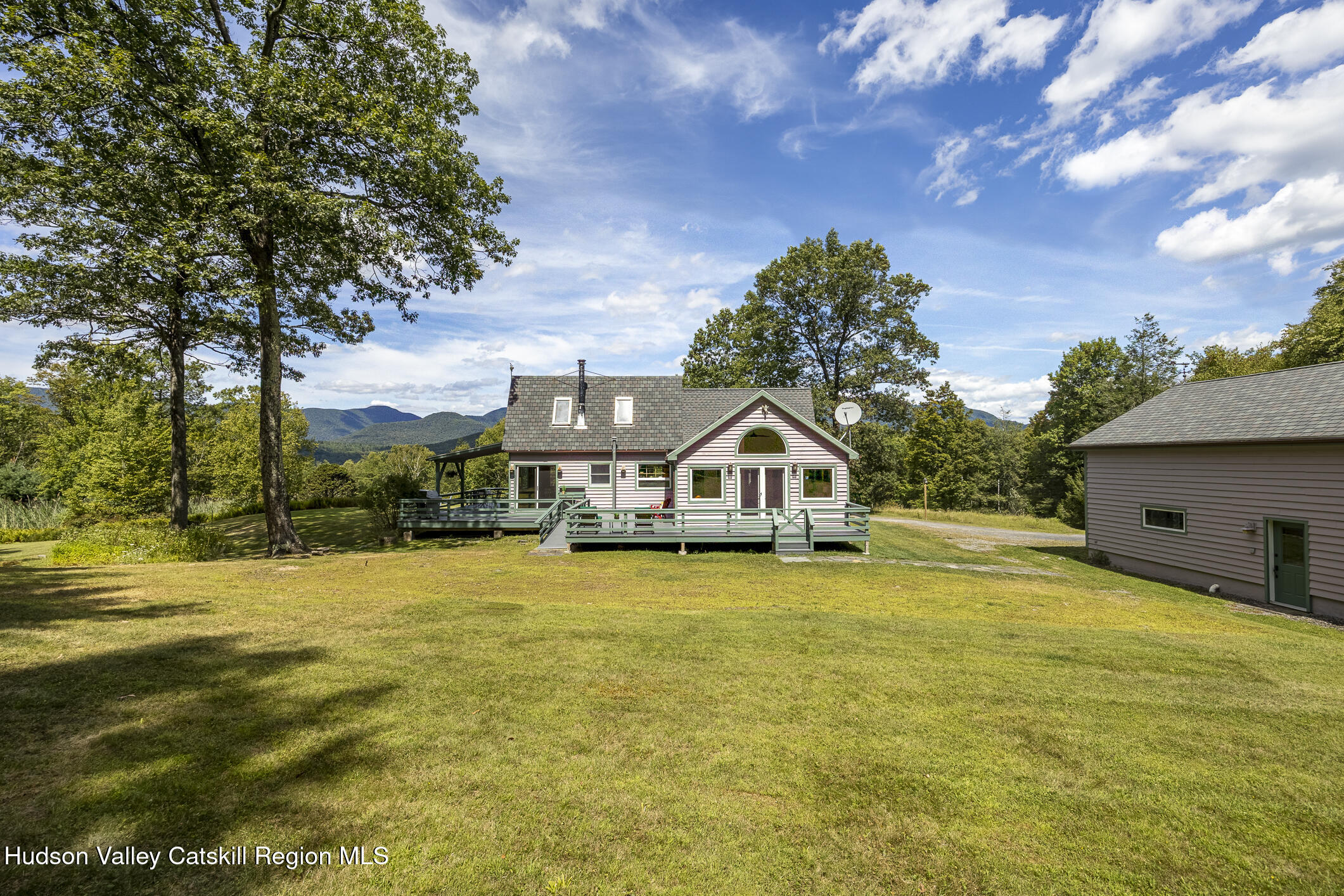 128 Newcut Road Woodstock, NY 12498 - Photo 44 of 51 a front view of a house with a yard