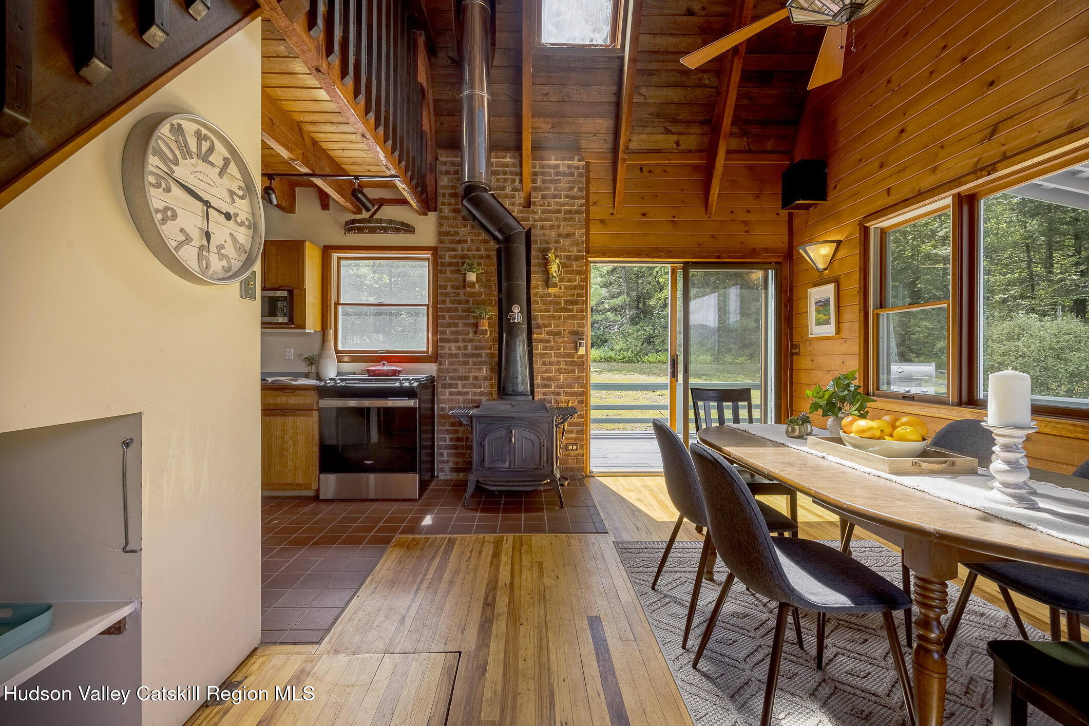 128 Newcut Road Woodstock, NY 12498 - Photo 9 of 51 a view of a dining room with furniture window and wooden floor