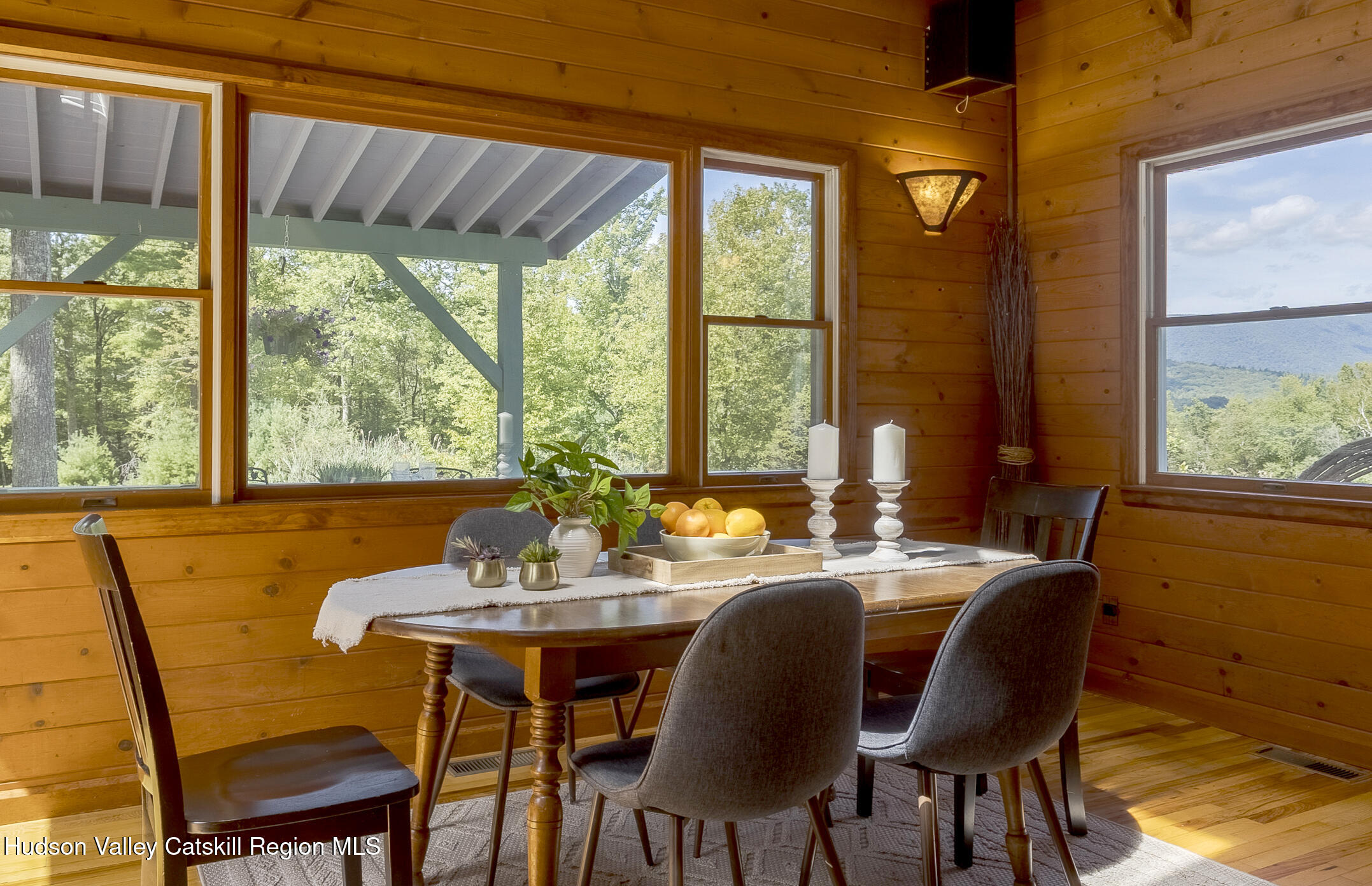 128 Newcut Road Woodstock, NY 12498 - Photo 10 of 51 a view of a dining room with furniture window and outside view