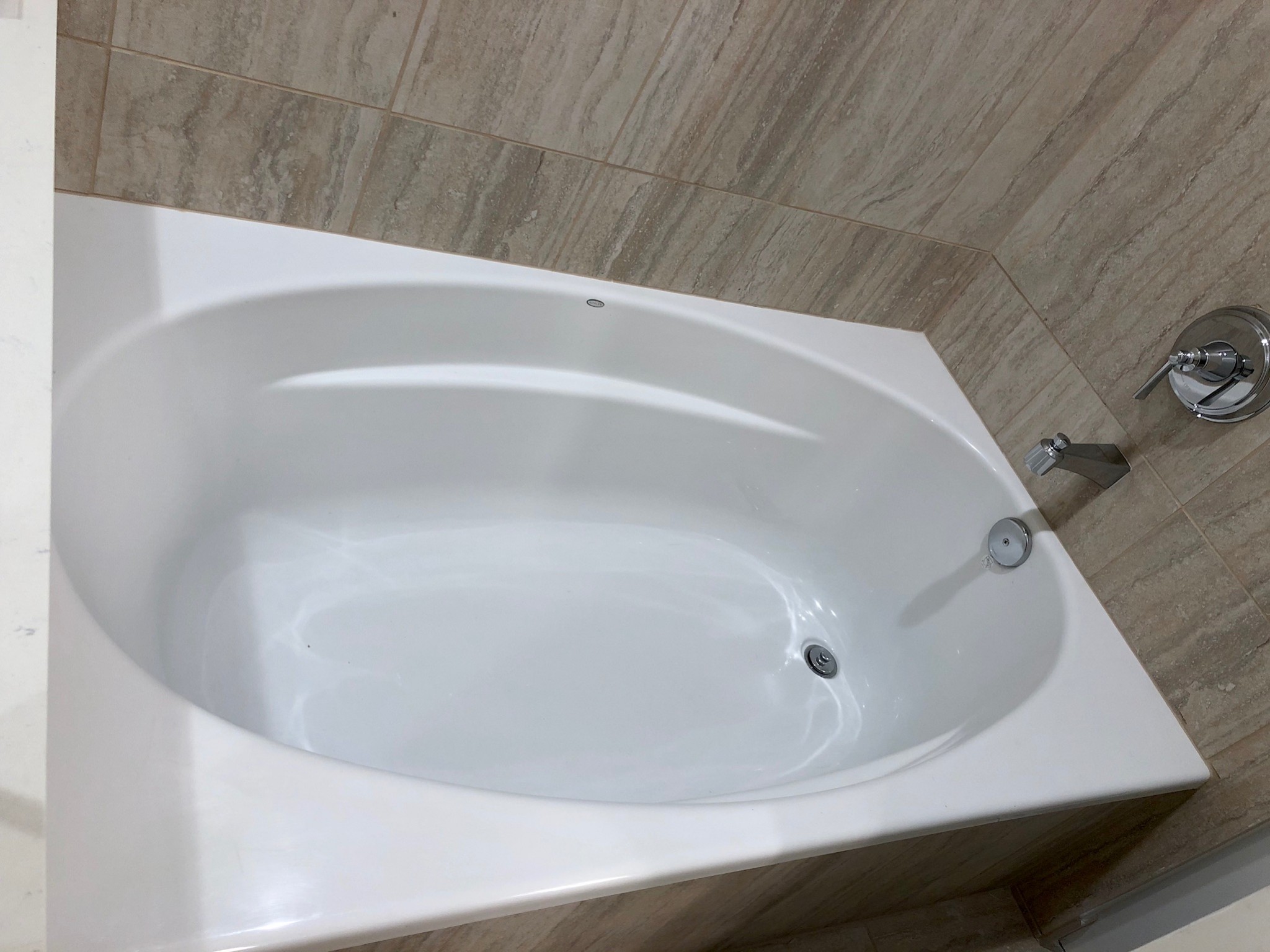 20 Rutledge Street, Unit 603 Nashville, TN 37210 - Photo 16 of 27 a view of a bathtub in a bathroom