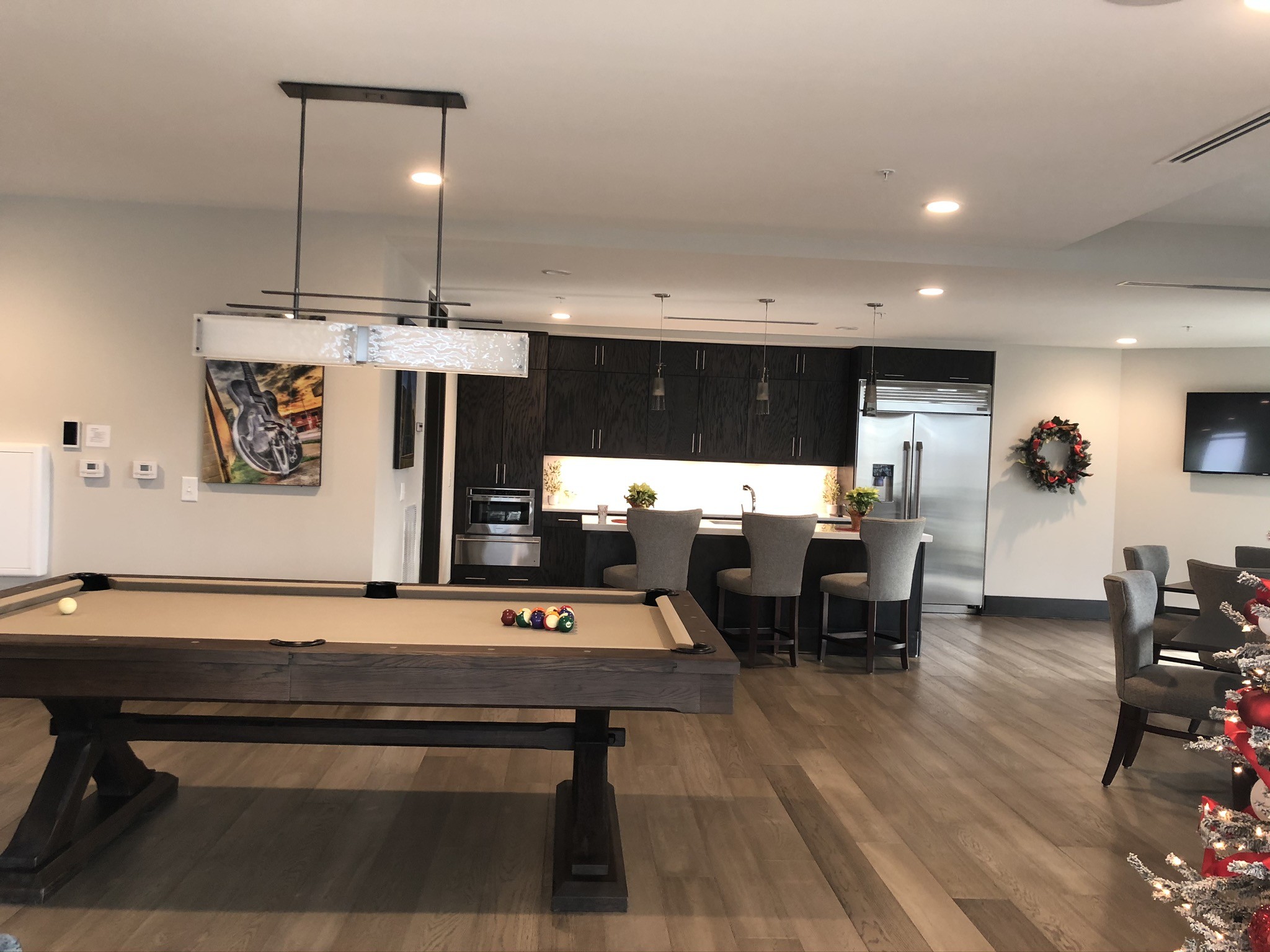 20 Rutledge Street, Unit 603 Nashville, TN 37210 - Photo 21 of 27 a living room with furniture pool table and chairs
