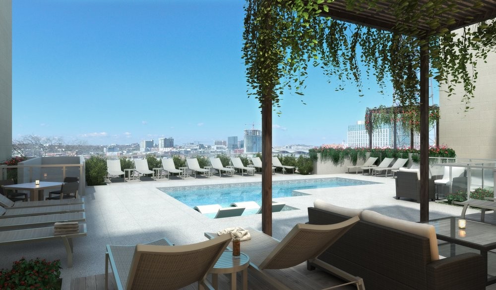 20 Rutledge Street, Unit 603 Nashville, TN 37210 - Photo 6 of 27 a view of swimming pool with outdoor seating and city view