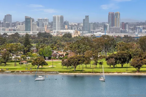 a view of a city with tall buildings