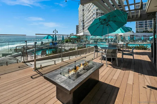 a view of a balcony with chairs