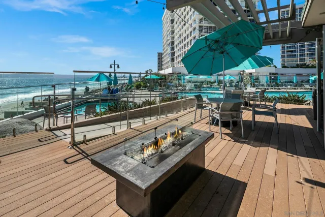 a view of a balcony with chairs