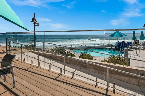 a view of swimming pool with outdoor seating
