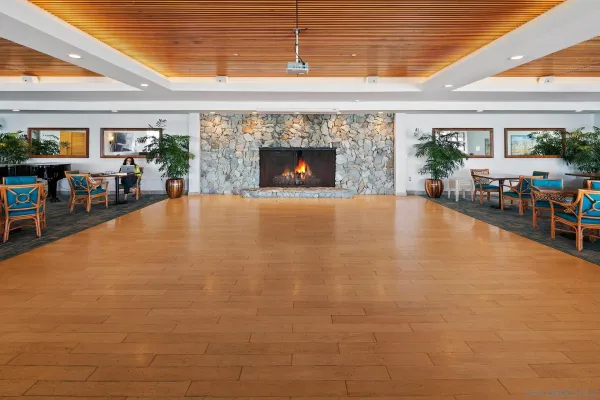 a living room with lots of furniture and lots of dining room