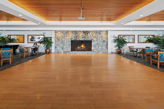 a living room with lots of furniture and lots of dining room