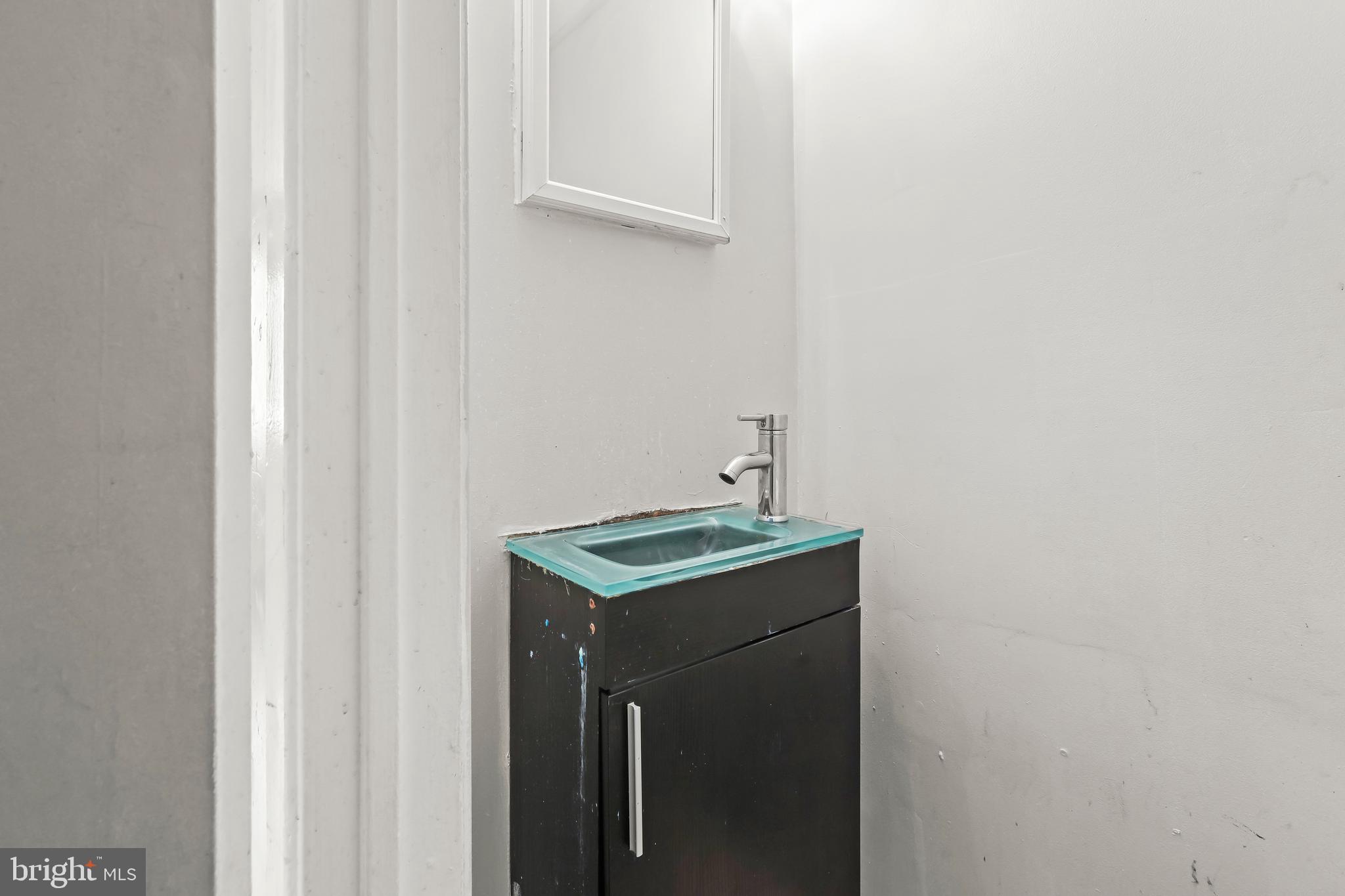 2217 Columbia Place Landover, MD 20785 - Photo 12 of 34 a utility room with a sink