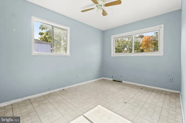 an empty room with windows