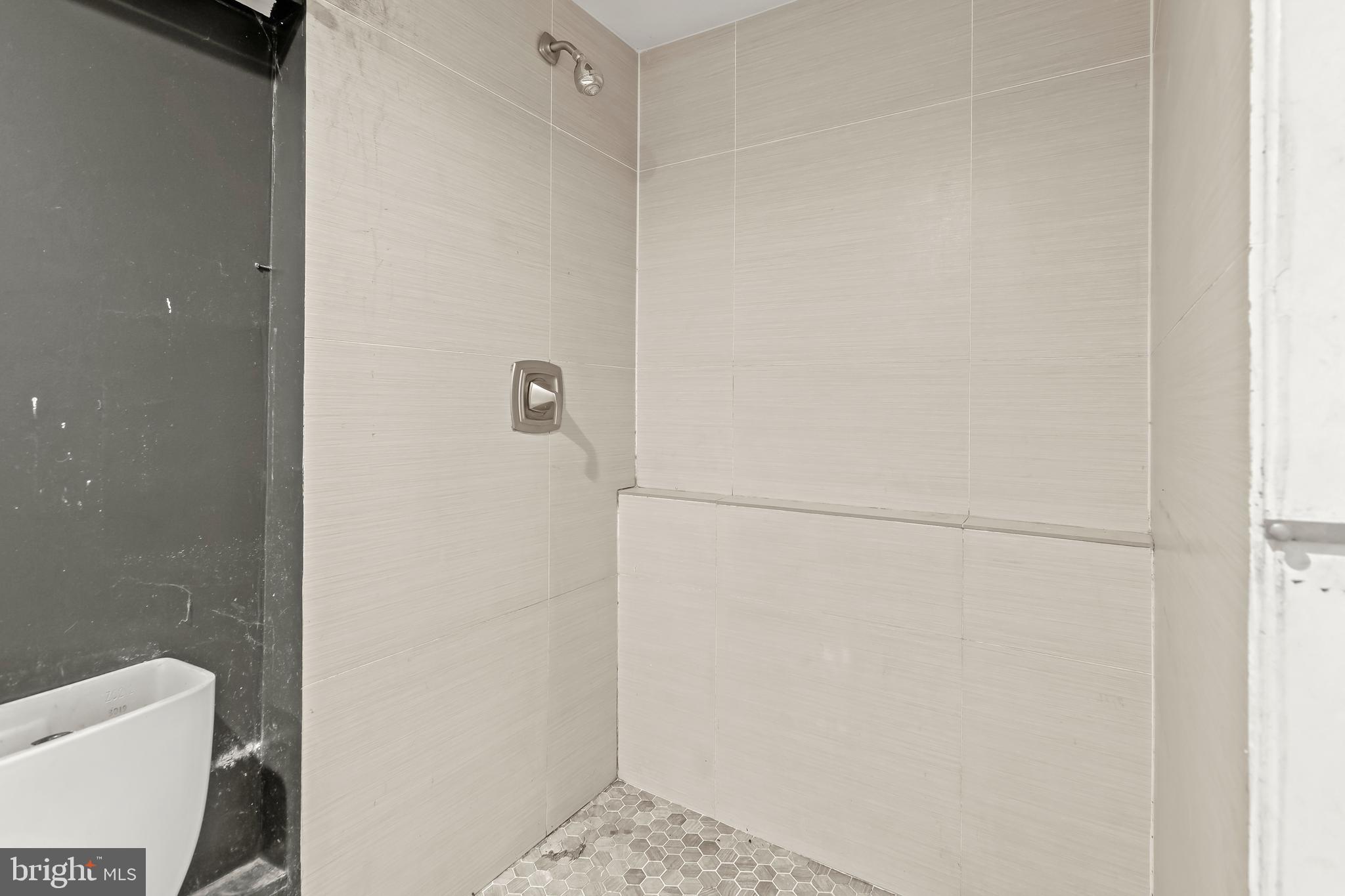 2217 Columbia Place Landover, MD 20785 - Photo 26 of 34 a bathroom with a shower