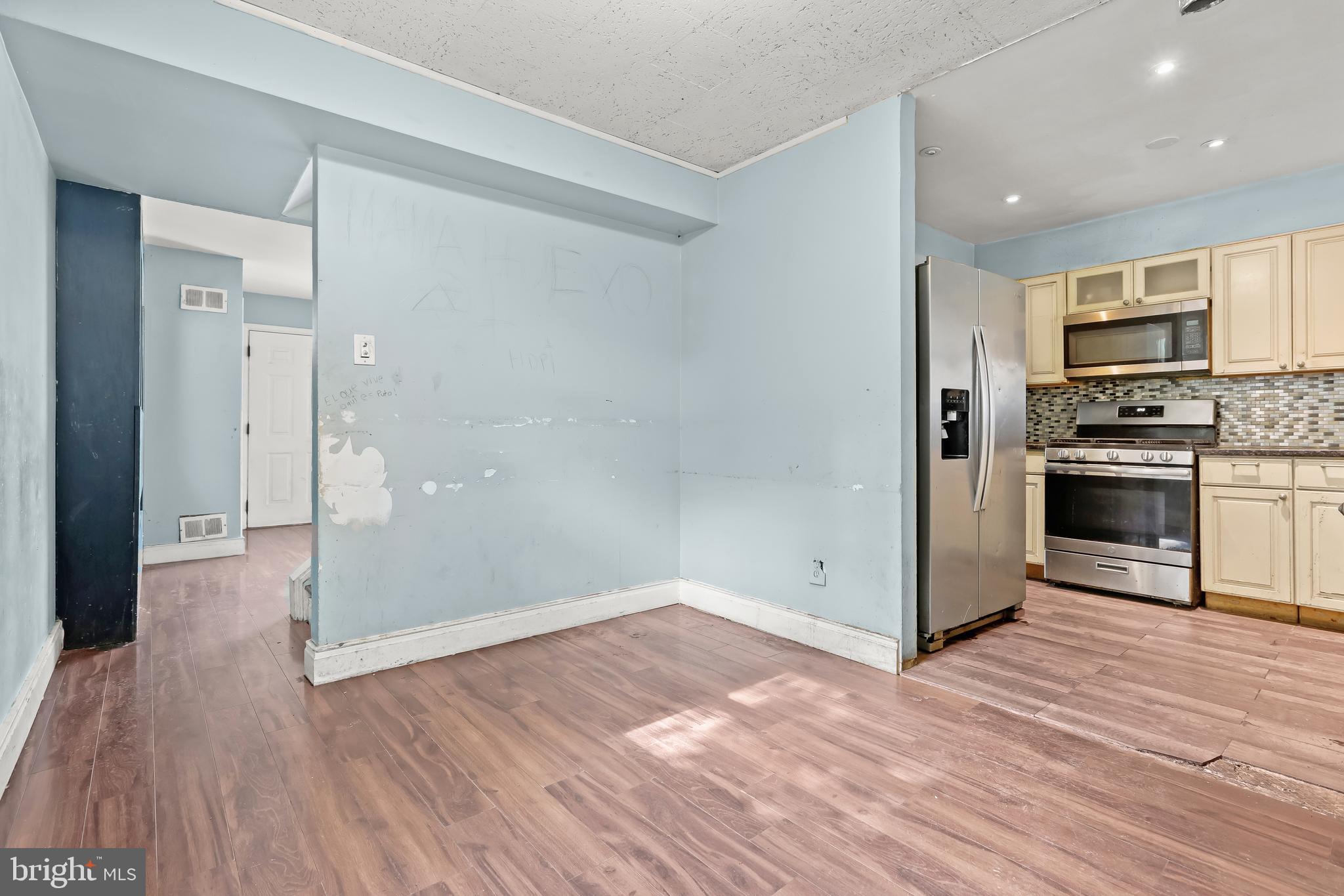 2217 Columbia Place Landover, MD 20785 - Photo 7 of 34 a view of a kitchen with a sink and a stove top oven