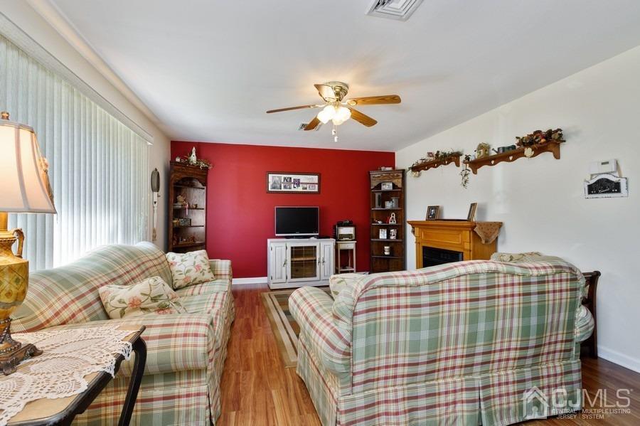 46 Weldon Road Edison, NJ 08817 - Photo 2 of 18 a living room with furniture