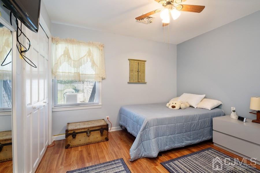 46 Weldon Road Edison, NJ 08817 - Photo 14 of 18 a bedroom with a bed and a window