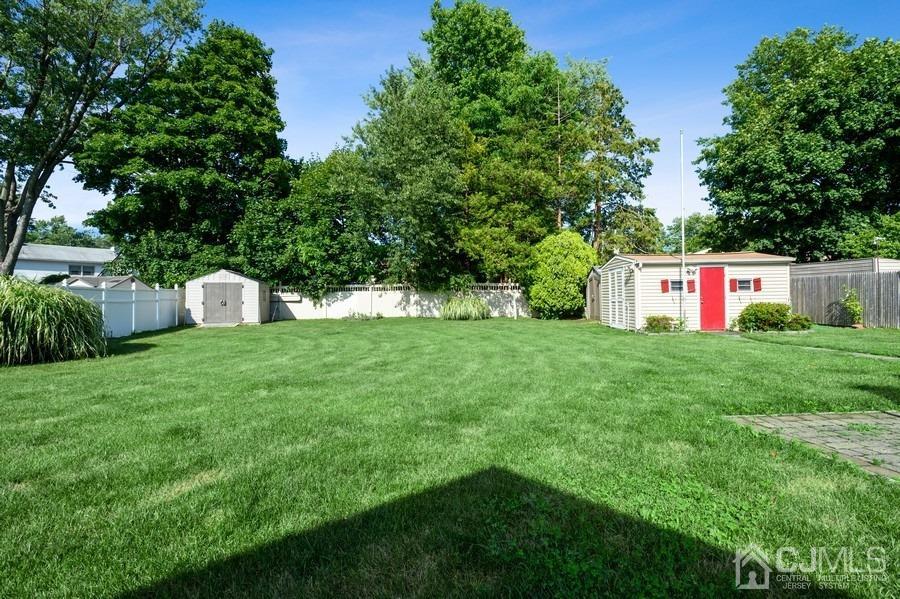46 Weldon Road Edison, NJ 08817 - Photo 18 of 18 a front view of house with yard and trees