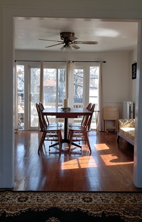119 Edendale Street Springfield, MA 01104 - Photo 8 of 15 a view of a dining room with furniture window and wooden floor