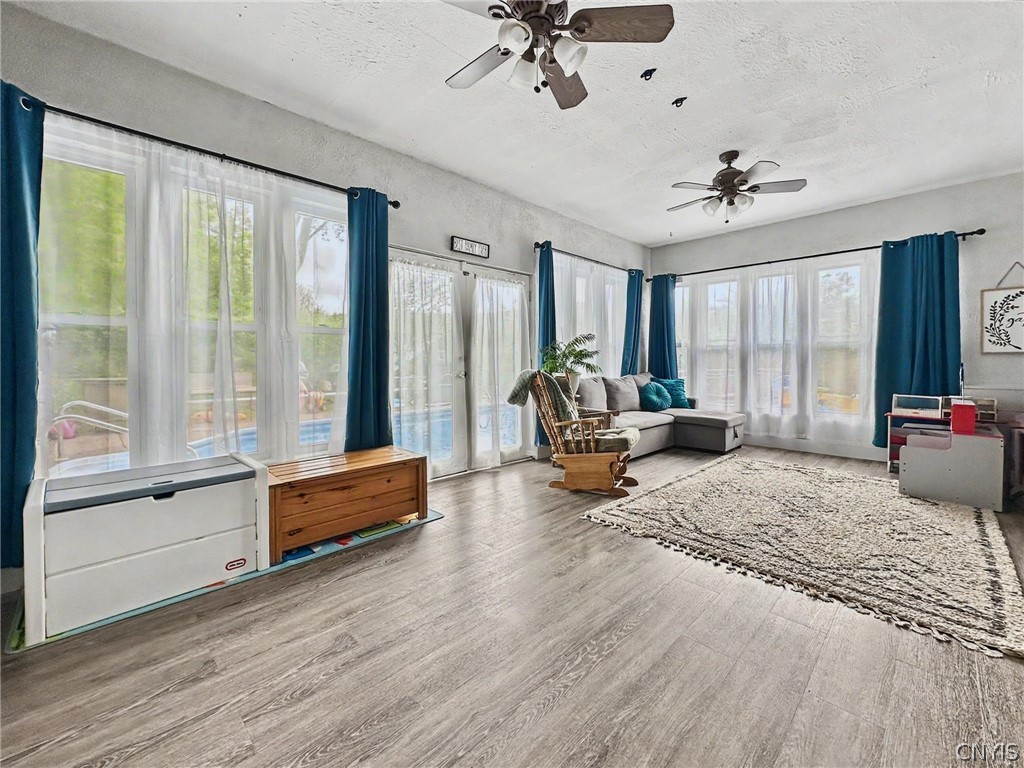 6628 East Homer-Baltimore Road Preble, NY 13077 - Photo 31 of 49 Living Room/Pool Entrance
