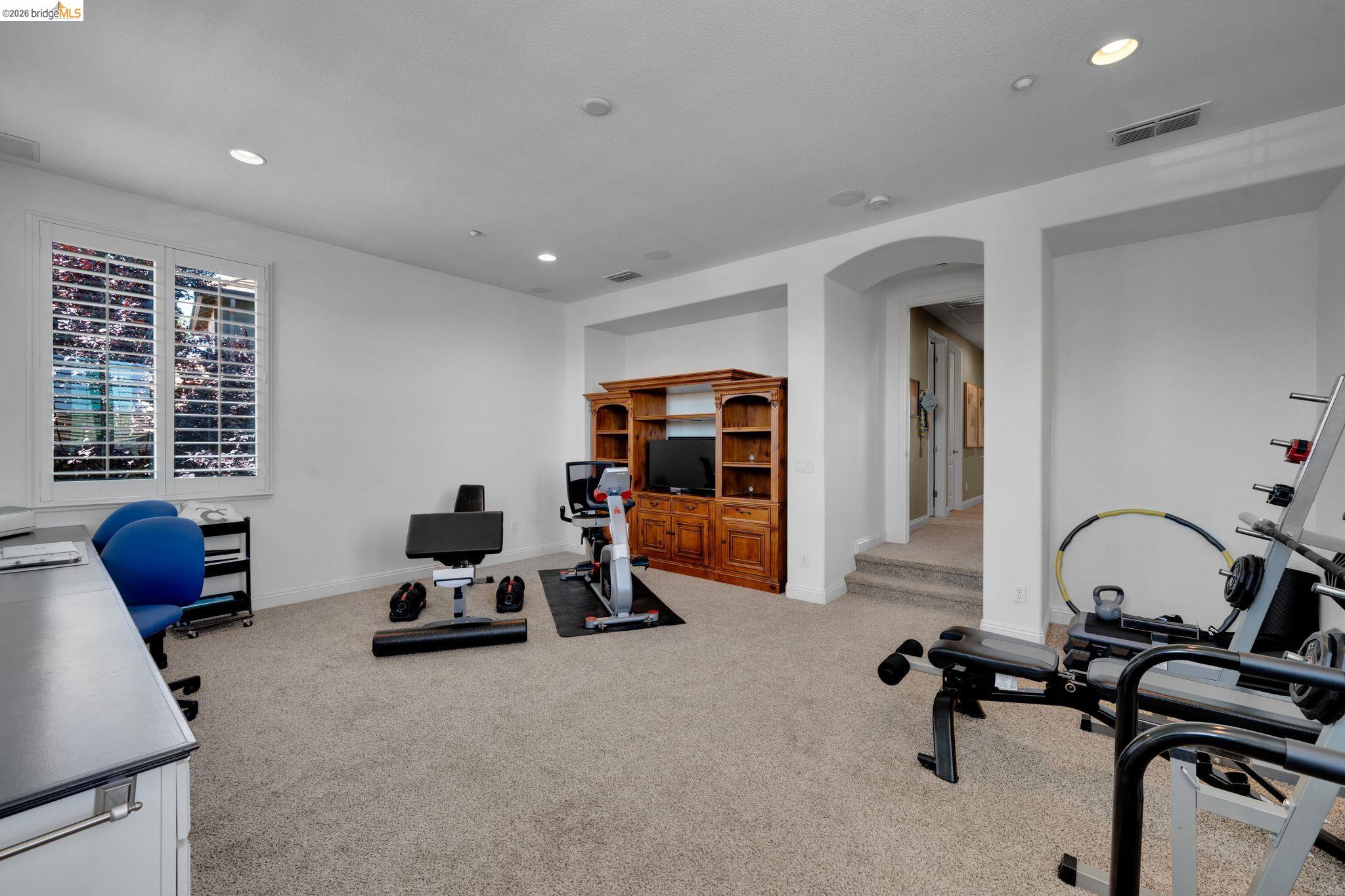 2513 Winged Foot Road Brentwood, CA 94513 - Photo 20 of 45 Spacious interior room featuring carpet flooring, recessed lighting, and a window with plantation shutters