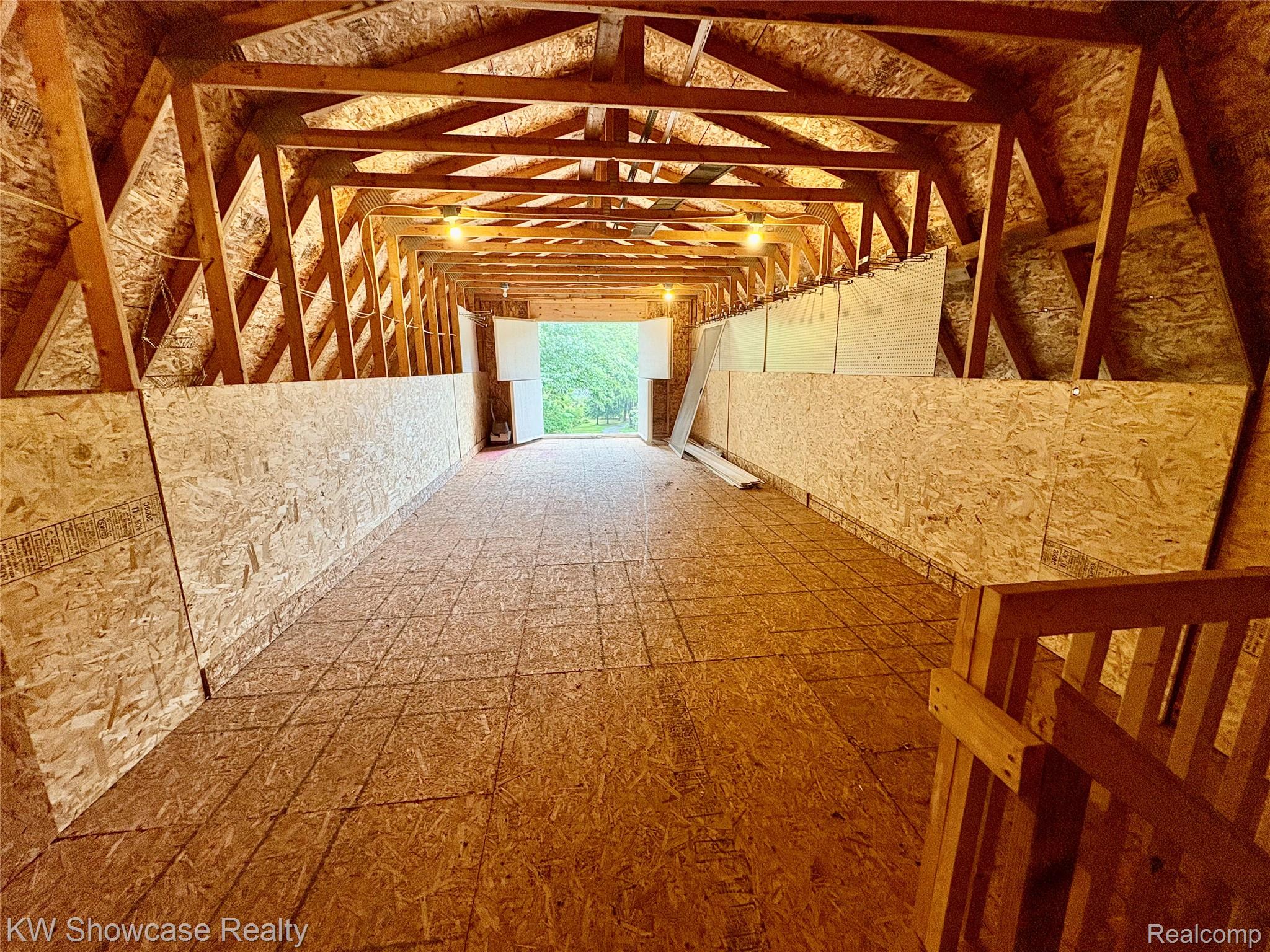 7125 Ridgewood Road Davisburg, MI 48350 - Photo 39 of 48 Pole Barn- Upstairs. Door opens completely for easy use