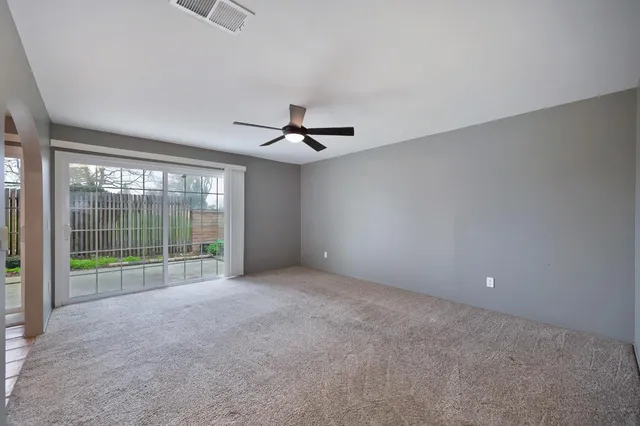 a view of a room with a large window