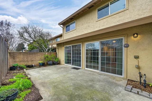 a view of a house with a yard and garage