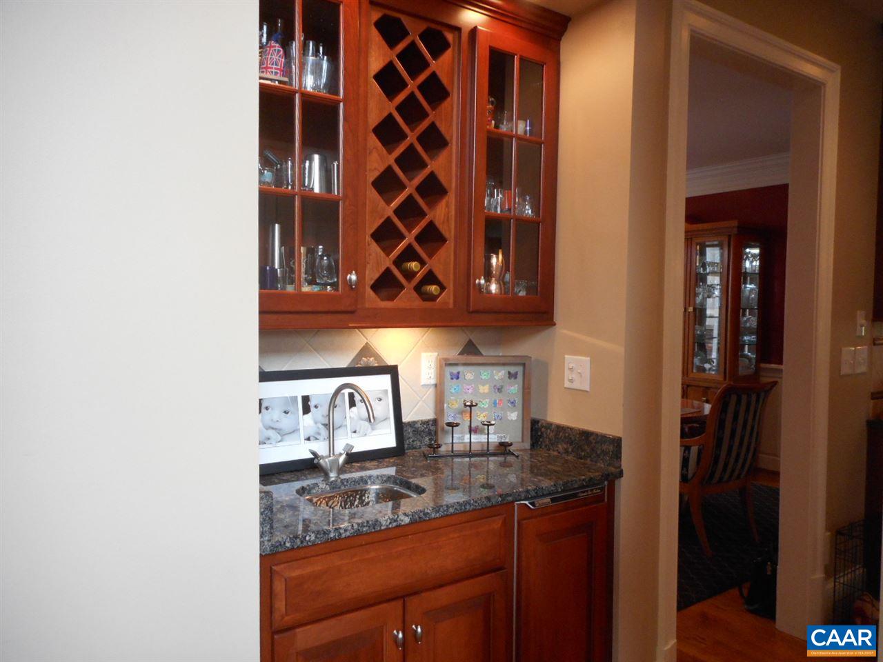 520 Rocks Farm Drive Charlottesville, VA 22903 - Photo 24 of 50 a kitchen with a sink and cabinets