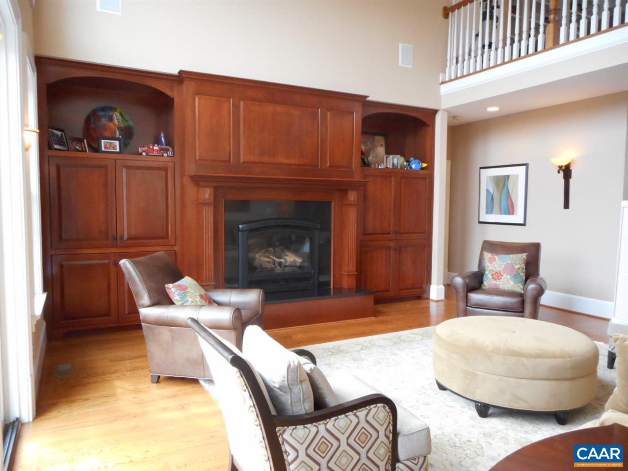 520 Rocks Farm Drive Charlottesville, VA 22903 - Photo 25 of 50 a living room with furniture and a fireplace