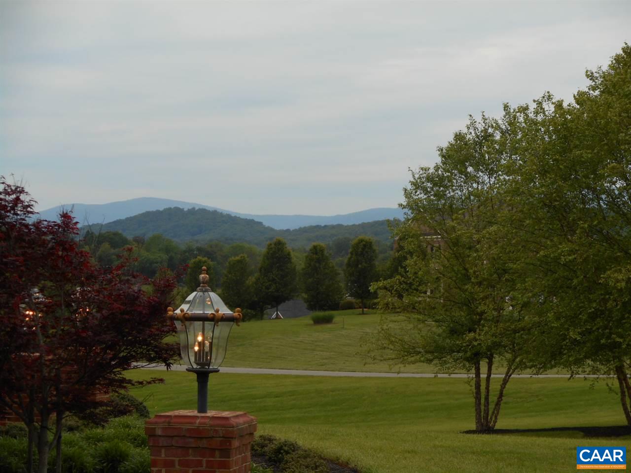 520 Rocks Farm Drive Charlottesville, VA 22903 - Photo 47 of 50 a view of a fountain in front of the house