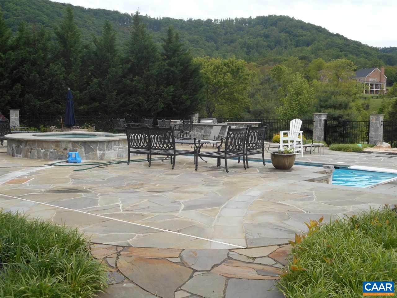 520 Rocks Farm Drive Charlottesville, VA 22903 - Photo 6 of 50 a view of a terrace with chairs