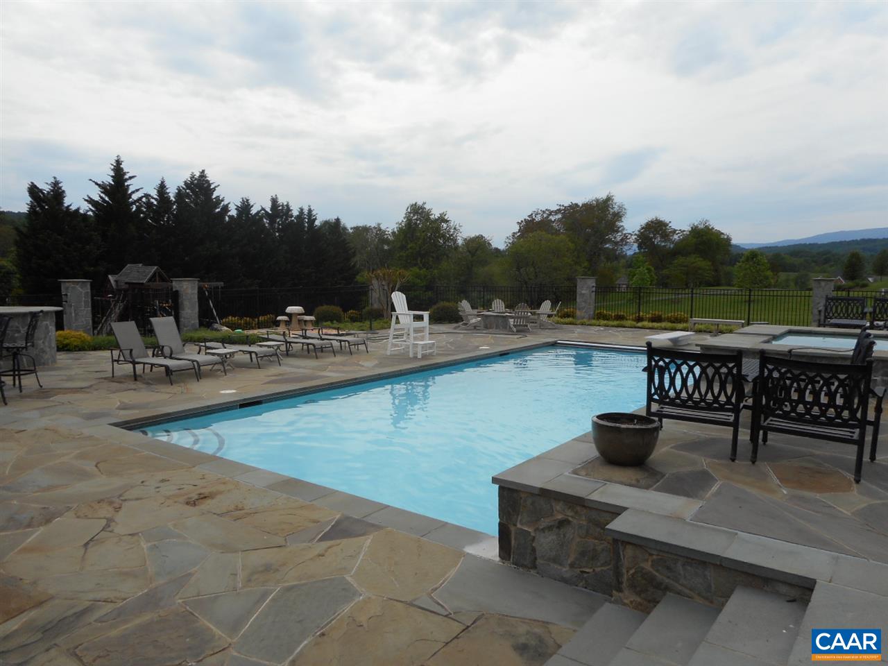 520 Rocks Farm Drive Charlottesville, VA 22903 - Photo 9 of 50 a view of a terrace with sitting area