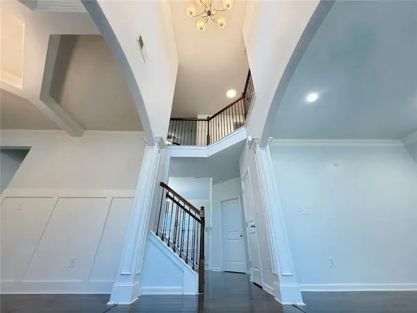 a view of entryway with wooden floor