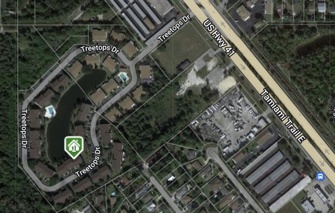 5327 Treetops Drive, Unit T205 Naples, FL 34113 - Photo 18 of 18 a front view of a house