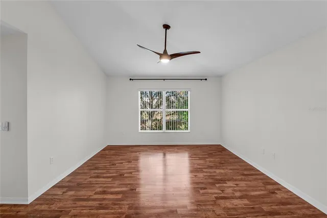 a view of a livingroom with wooden floor