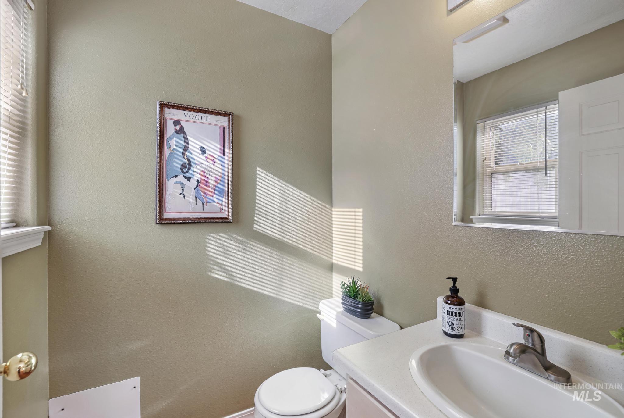 1935 Hampton Way Twin Falls, ID 83301 - Photo 13 of 25 Bathroom with a textured wall and vanity