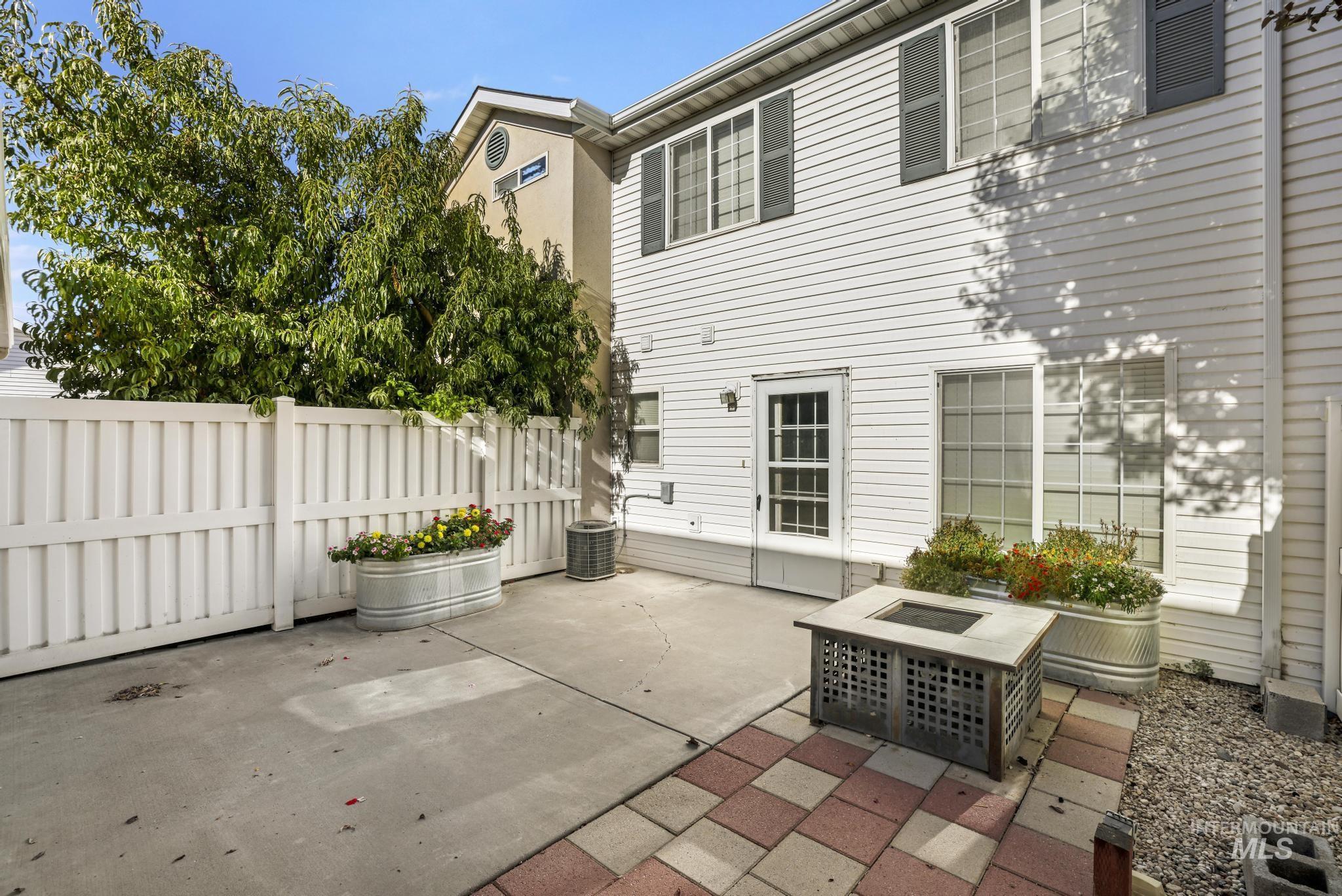 1935 Hampton Way Twin Falls, ID 83301 - Photo 3 of 25 View of patio / terrace with a fire pit