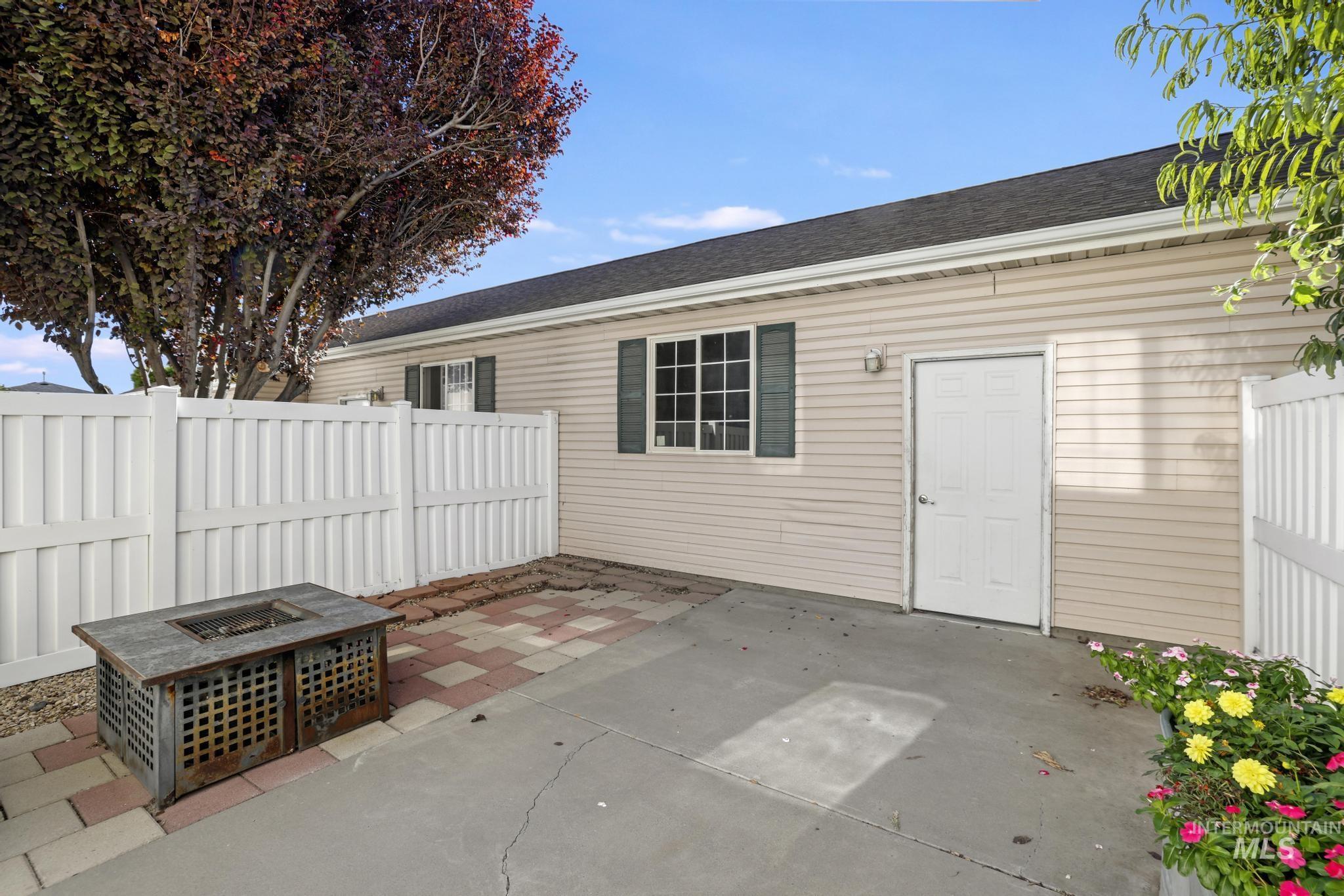 1935 Hampton Way Twin Falls, ID 83301 - Photo 4 of 25 View of patio / terrace with a fire pit