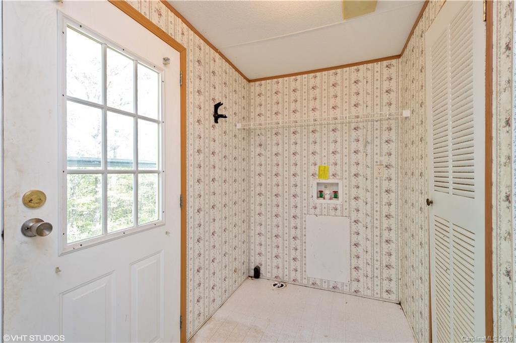 662 Lake Adger Road Mill Spring, NC 28756 - Photo 17 of 20 a bathroom with a shower