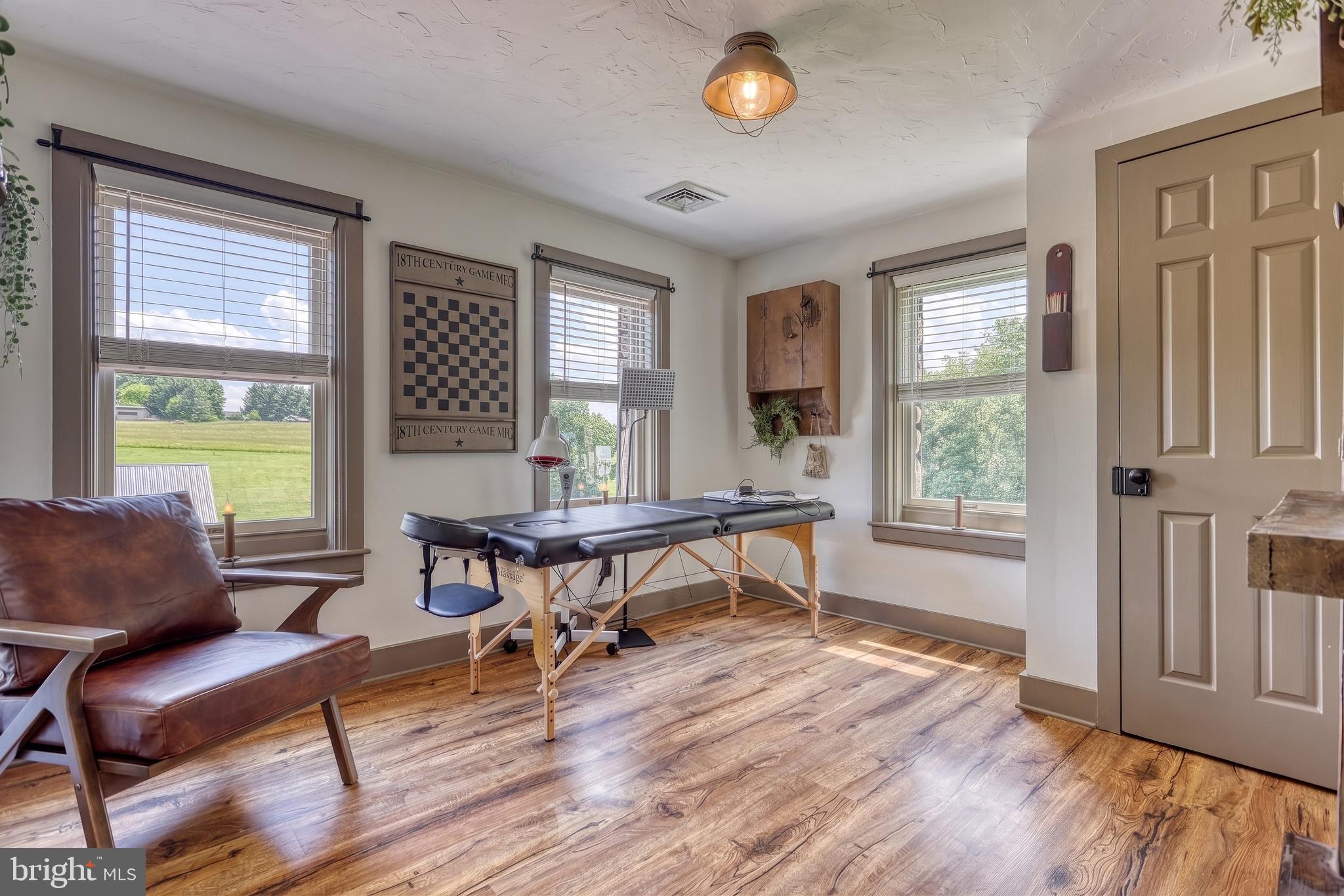 2415 Clearview Lane Spring Grove, PA 17362 - Photo 20 of 149 a living room with furniture and a wooden floor
