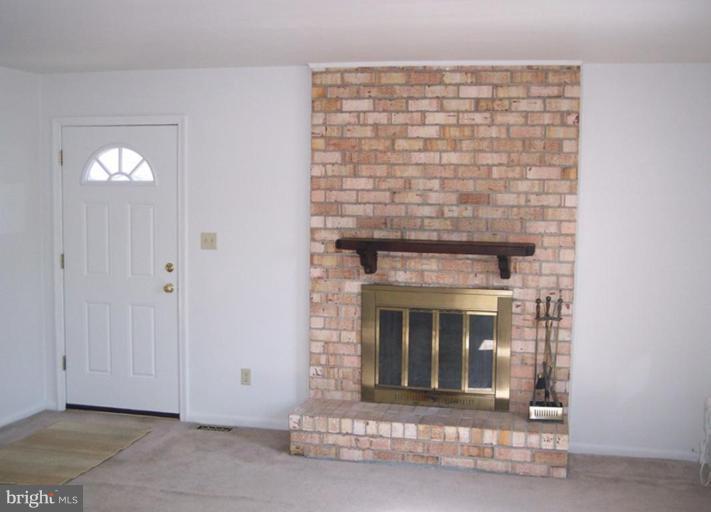 815 Corktree Road, Unit 815 Middle River, MD 21220 - Photo 2 of 13 a living room with a fireplace