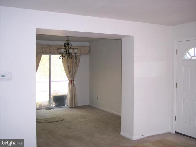 815 Corktree Road, Unit 815 Middle River, MD 21220 - Photo 7 of 13 a view of a room that has a window and storage